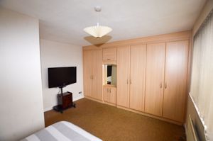 Bedroom One- click for photo gallery